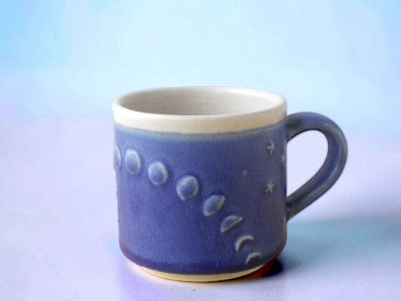 Lunar Rhythm: One-of-a-Kind Artisan Mug Embraced by the Shifting Night Sky