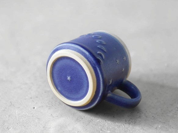 Lunar Rhythm: One-of-a-Kind Artisan Mug Embraced by the Shifting Night Sky